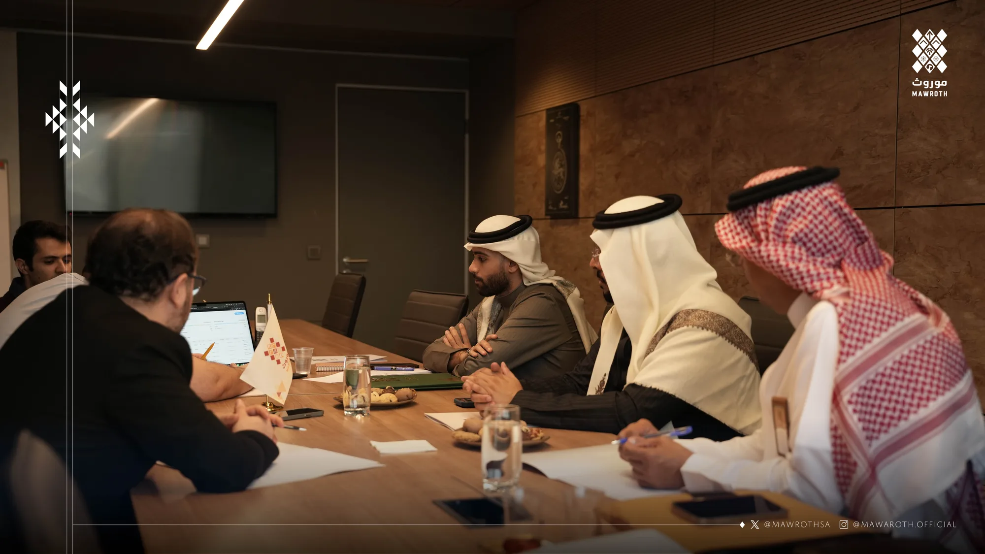 Wide view of the full boardroom with Mawroth and Nodeflam teams engaged in the strategic meeting