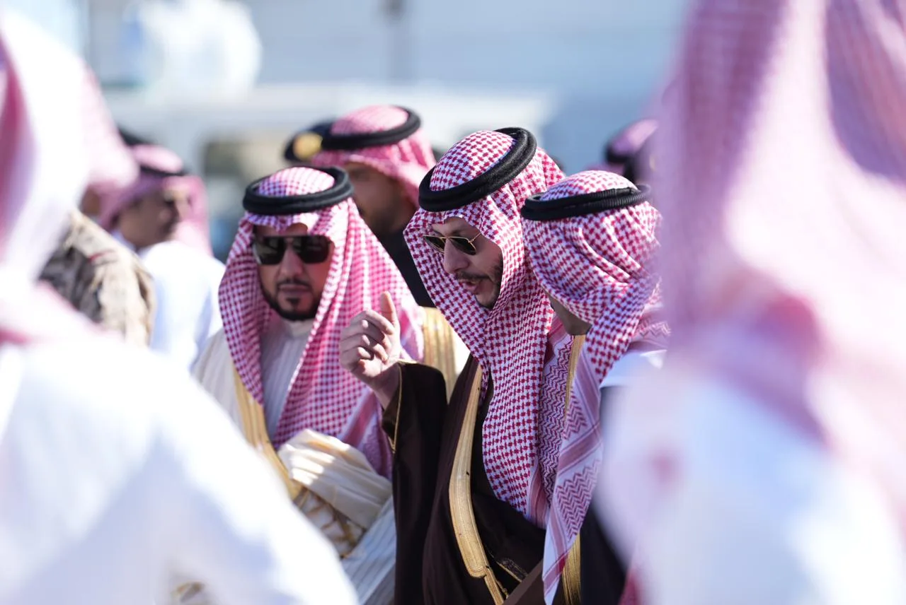 Saudi dignitaries in traditional dress gathered at the Taif Falcon Cup 2025 event grounds